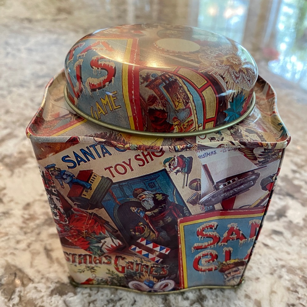Vintage looking Christmas Tin with old advertisements